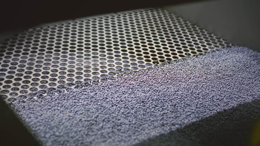 Extruder machine makes plastic granules, recycling polypropylene. Gray plastic pellets. Raw material for plastic or Polyethylene products. Garbage factory or waste plant. Recycling of plastic items