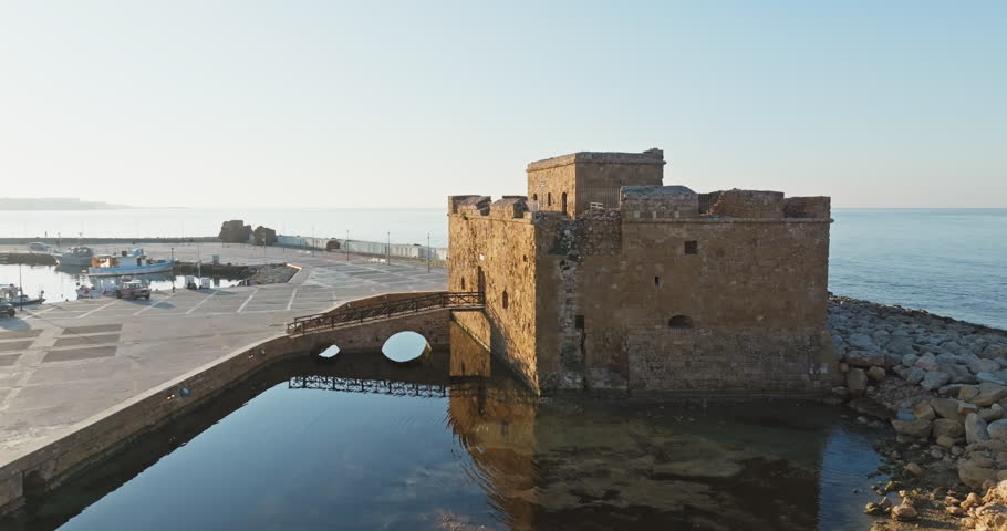 Exploring Paphos, Cyprus: Aerial View of the Historic Stone Castle Fort by the Sea, Offering a Glimpse into the Past. High quality 4k footage