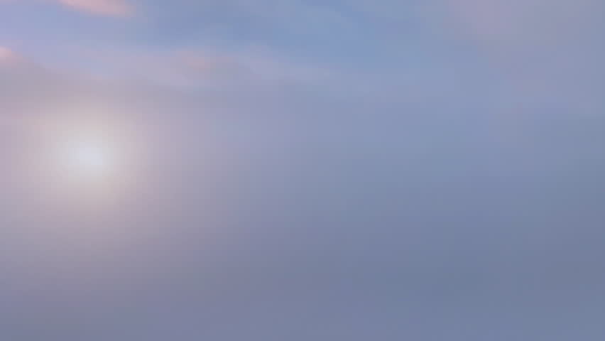 Aerial view of Mount Fuji with beautiful clouds over a clear sky and morning mist at sunrise. Japan