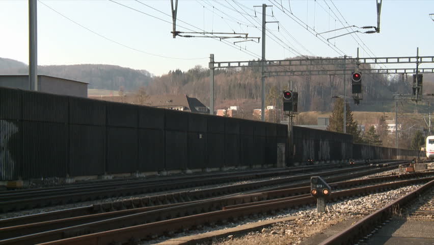 German ICE Intercity train (ICE 1) driving by. from right to left. Liestal train station. Switzerland Royalty-Free Stock Footage #34886236