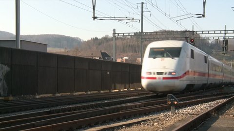 German ICE Intercity train (ICE 1) driving by. from right to left. Liestal train station. Switzerland