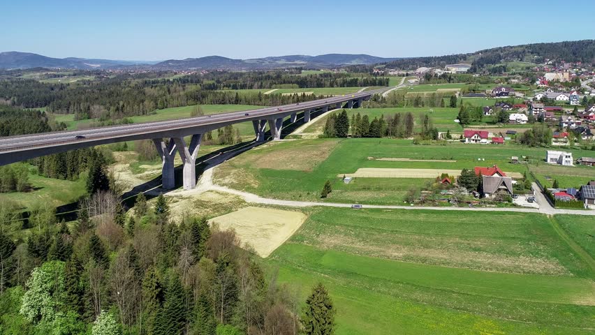 New highway in Poland on national road no 7, E77, called Zakopianka.  Skomielna Biała village on the right. Aerial 4K video
