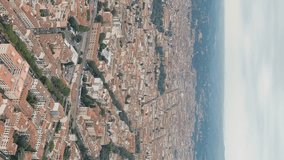 Vertical video. Florence, Italy. General view of the city in cloudy weather. Summer, Aerial View, Departure of the camera
