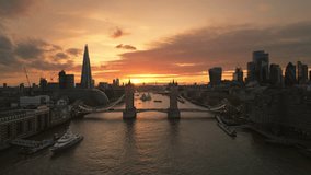 Aerial View Shot of London UK, United Kingdom, Shard Tower Bridge Tower of London, enchanted sunset