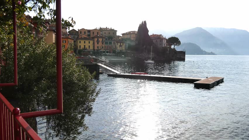 a glimpse of the lake Como, Lombardy, Italy and in the background the village of Varenna.