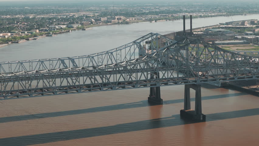 Aerial shot of bridge over Mississippi River and downtown city skyline New Orleans, Louisiana
