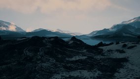 Spectacular scenery of rocky mountain range covered with snow located on shore of frozen sea - Powered by Shutterstock - Get 15% off with code: PIKWIZARD15