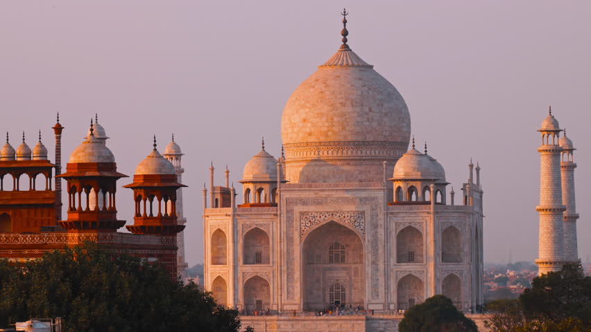 Taj Mahal In Agra, Uttar Pradesh, India. Sunset Dusk Timelapse Of Taj Mahal. Seven World Wonders. Fabulous Taj Mahal Travel Concept. Crowds Of Tourists Visit Taj Mahal. Indian Islamic Heritage At Dusk