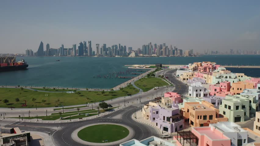 Aerial Perspective of Old Doha Port Against Majestic Cityscape