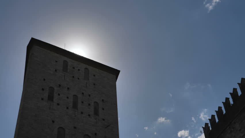 Sun rising over tower in rome, italy