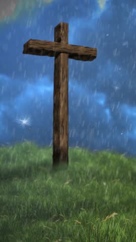 Vertical Cross on a Hill Approaching Storm 4K Loop features an old wooden cross in a grassy field with wind-blown rain, clouds, and dandelion seeds in the atmosphere in a vertical ratio loop. Royalty-Free Stock Footage #3490045571
