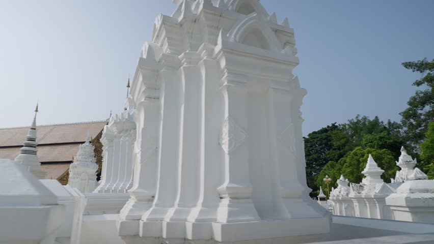 Dolly shot of golden pagoda at Suandok temple Chiangmai thailand steady cam 