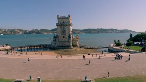Portugal Lisbon Belem Tower Aerial view Tagus river Famous tower Summer  4k Peole around Tourists