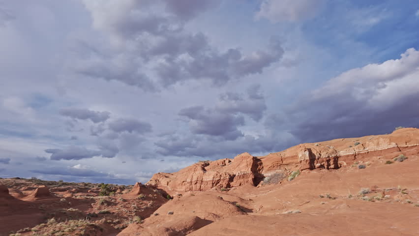 Panning view over the Escalante desert as the sandstone glows in the Utah wilderness.