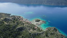 antalya kekova kalekoy castle aerial drone video turquoise blue sea cloudy sky settlement port and peninsula