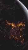 A detailed view of Earth from space, highlighting city lights and natural phenomena, captured during the night.