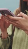 Vertical video, Close-up of woman's hands holding mobile phone