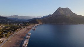 antalya adrasan beach aerial drone video turquoise blue sea clear sky settlement port and ships