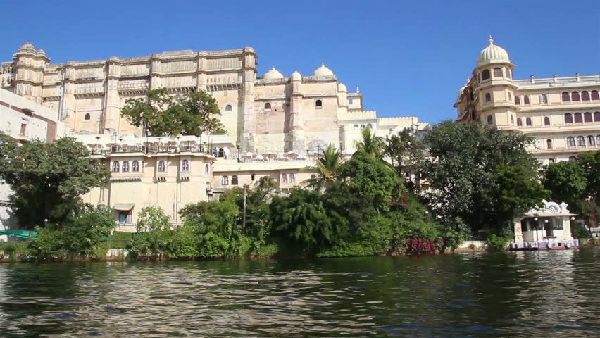 timelapse view from boat on lake and palaces in Udaipur India