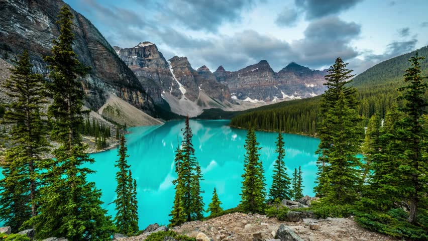 Golden Hour Magic: Time-Lapse Sunset Over Ten Peaks at Moraine Lake, Banff National Park, Alberta, Canada - Captured in Exquisite 4K Video Royalty-Free Stock Footage #3490638903