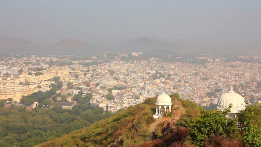 pan landscape with lake and palaces in Udaipur India