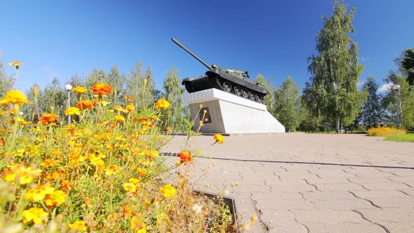 Military tank standing on pedestal. Second world war memorial park. Great victory over Nazi Germany. Park of remembrance of World War II