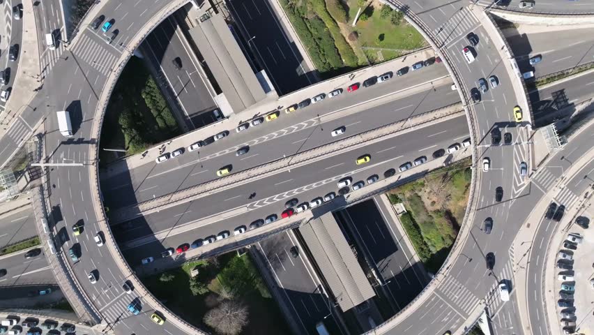 Roundabout Aerials, Circle, Traffic, Intersection, Roads, Cars, Highway, Athens, Marousi, Aerial View, Daytime, 4K Resolution, Urban, Transportation, Cityscape, Drone Footage, Overhead Shot, Vehicles, Royalty-Free Stock Footage #3490895457