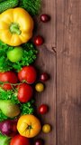 Vertical video. Healthy eating ingredients: fresh vegetables, fruits and superfood. Nutrition, diet, vegan food concept.