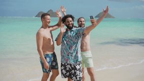 Amidst laughter and blue skies, three friends share a moment, making video call or capturing selfies as they enjoy the sun-kissed turquoise shores, each sporting contrasting beachwear. Slow motion.  - Powered by Shutterstock - Get 15% off with code: PIKWIZARD15