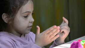 kids play with clay molding shapes, learning through play. Plasticine. dough for play. Girl molding modeling clay. Homemade clay. children's creativity, early development, fine motor skills. - Powered by Shutterstock - Get 15% off with code: PIKWIZARD15
