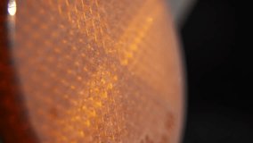 macro video of a motorcycle light, slide up movement