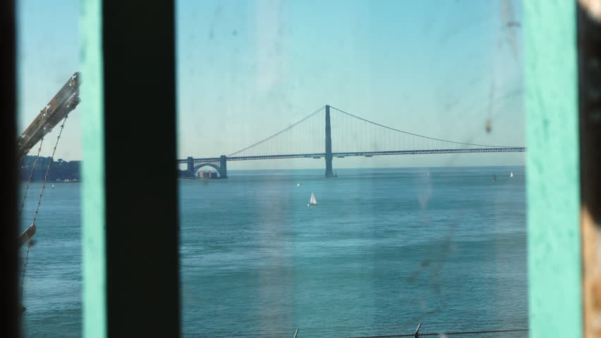 Alcatraz Prison, View of Golden Gate Bridge and San Francisco Bay From Window With Metal Bars Royalty-Free Stock Footage #3491545917