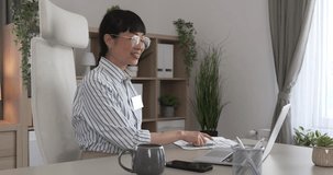 Mature japanese woman have a consultation via video call at office