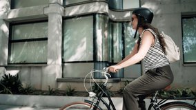 Video of confident cheerful woman riding electric push scooter through the city - Powered by Shutterstock - Get 15% off with code: PIKWIZARD15