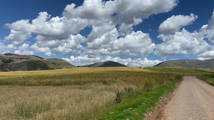 Landscape video of a valley with mountains and fields of quinoa and barley. Huancayo, Perú.