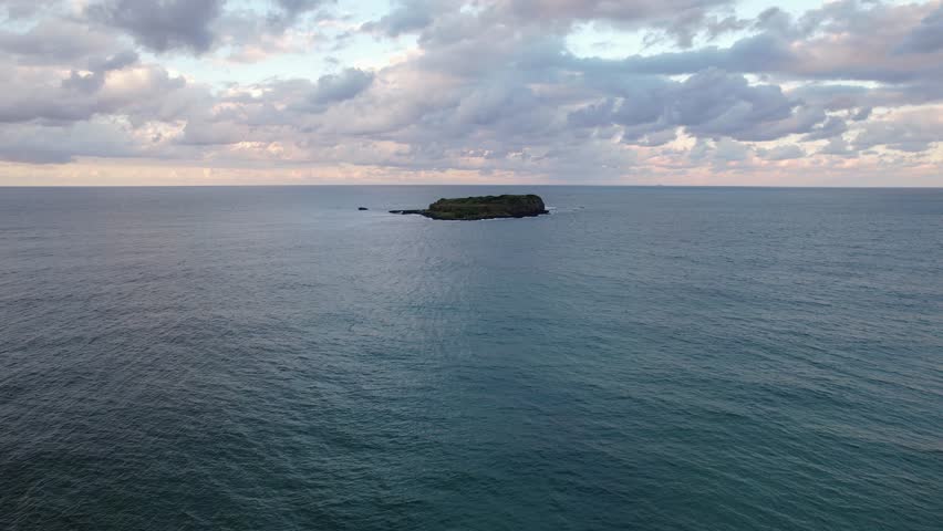 Flying Towards Cook Island Nature Reserve Near Fingal Head In New South Wales, Australia. Aerial Shot