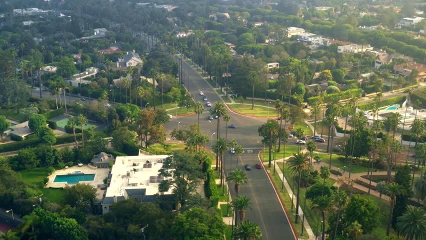 Aerial view of city traffic at road intersection, Car traffic on city streets, Car movement at a roundabout intersection Royalty-Free Stock Footage #3491837339