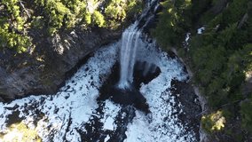 4K aerial drone video footage of frozen Tamanawas falls in Oregon, USA