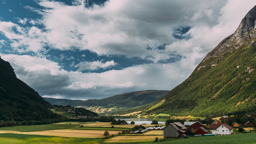 Byrkjelo Village, Sogn Og Fjordane County, Norway. Beautiful Sky Above Norwegian Rural Landscape. Bergheimsvatnet Lake In Summer Day. Agricultural And Weather Forecast Concept. Time-lapse 4k. Royalty-Free Stock Footage #3491916497