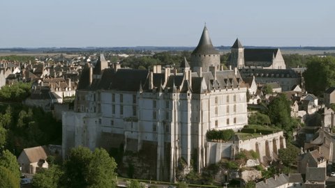 Aerial: Majestic French Ch�teau Stands Tall Amidst The Quaint Houses Of The Loire Valley, A Testament To The Region'S Rich Historical Tapestry. - Chateaudun, France Stockvideó