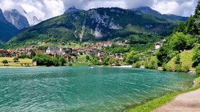 Most scenic mountain lakes in northern Italy - beautiful Molveno in Trento, Trentino Alto Adige region. 4k hd video
