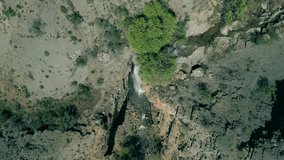 aerial video shot from mountains and waterfall