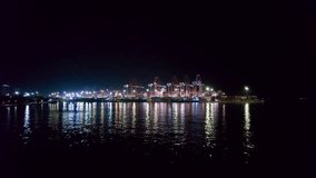 Night aerial view of gantry cranes, cargo ships and containers at cargo terminal of large international sea port - Powered by Shutterstock - Get 15% off with code: PIKWIZARD15