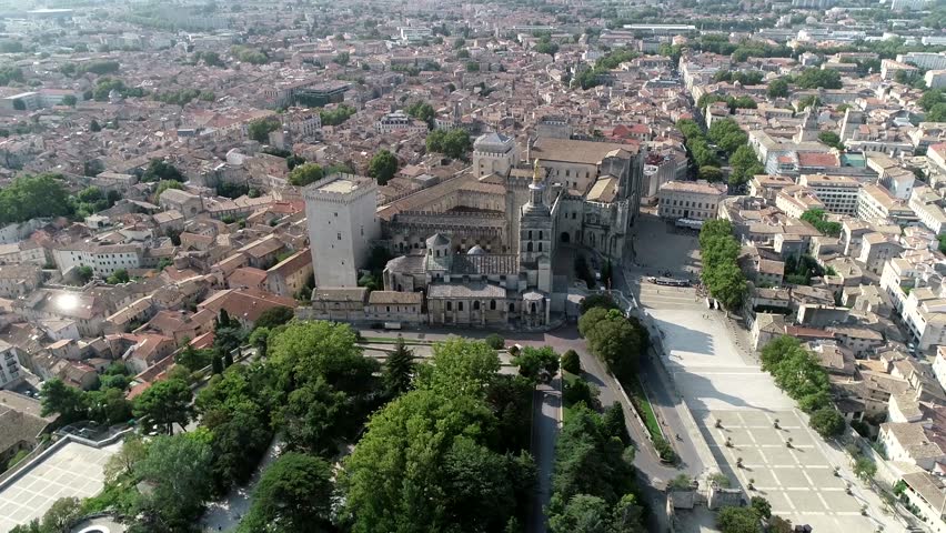 Aerial drone view of The Palais des Papes is an historical palace located in Avignon Southern France and is one of the largest and most important medieval Gothic buildings in Europe 4k high resolution