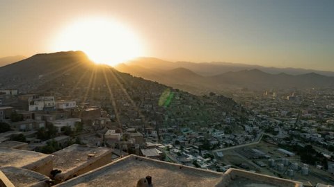 View of Kabul from high position. Time Lapse sunset. Residential area. Summer. Afghanistan