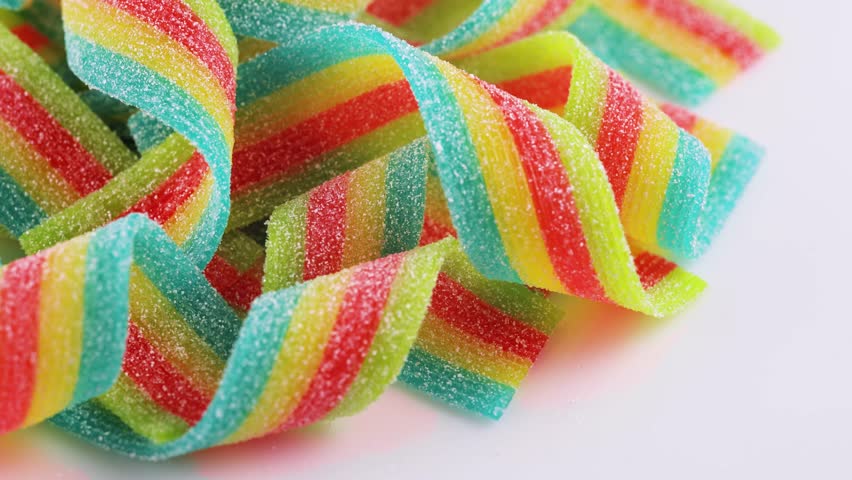 colored jelly candy strips in sugar sprinkles.