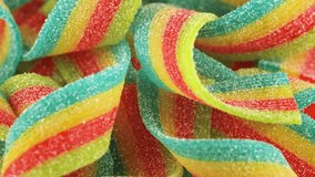 Rainbow sour jelly candies strips in sugar sprinkle. - Powered by Shutterstock - Get 15% off with code: PIKWIZARD15