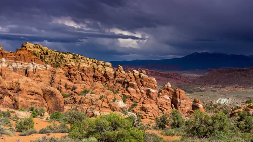Fiery Furnace and Distant Mountains, Arches National Park - Time Lapse.