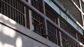 Alcatraz Prison Cellhouse, Closed Prison Cells on Gallery in Block C, Low Angle. California USA - Powered by Shutterstock - Get 15% off with code: PIKWIZARD15