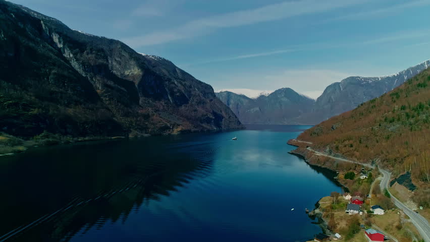 Scenic View of Sognefjord Amidst Towering Cliffs And Valley In Vestland County, Western Norway. aerial shot Royalty-Free Stock Footage #3493196831